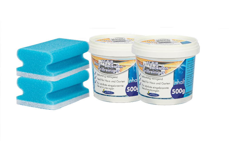 Zwei 500-g-Dosen AC PUR Herd-, Backofen- und Grillreiniger mit zwei blauen Reinigungsschwämmen auf weißem Hintergrund.
