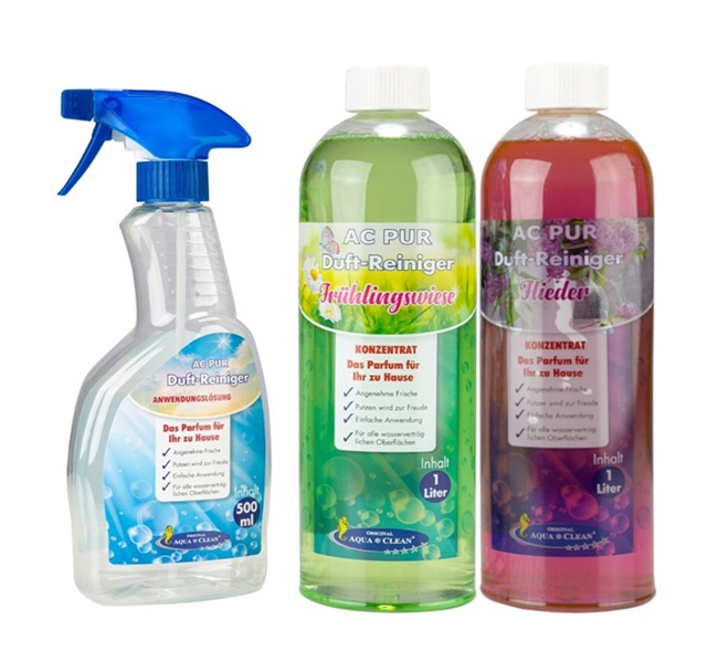AC PUR Duft-Reiniger Set mit je 1 Liter Frühlingswiese- und Flieder-Konzentrat sowie einer 500-ml-Sprühflasche auf weißem Hintergrund.